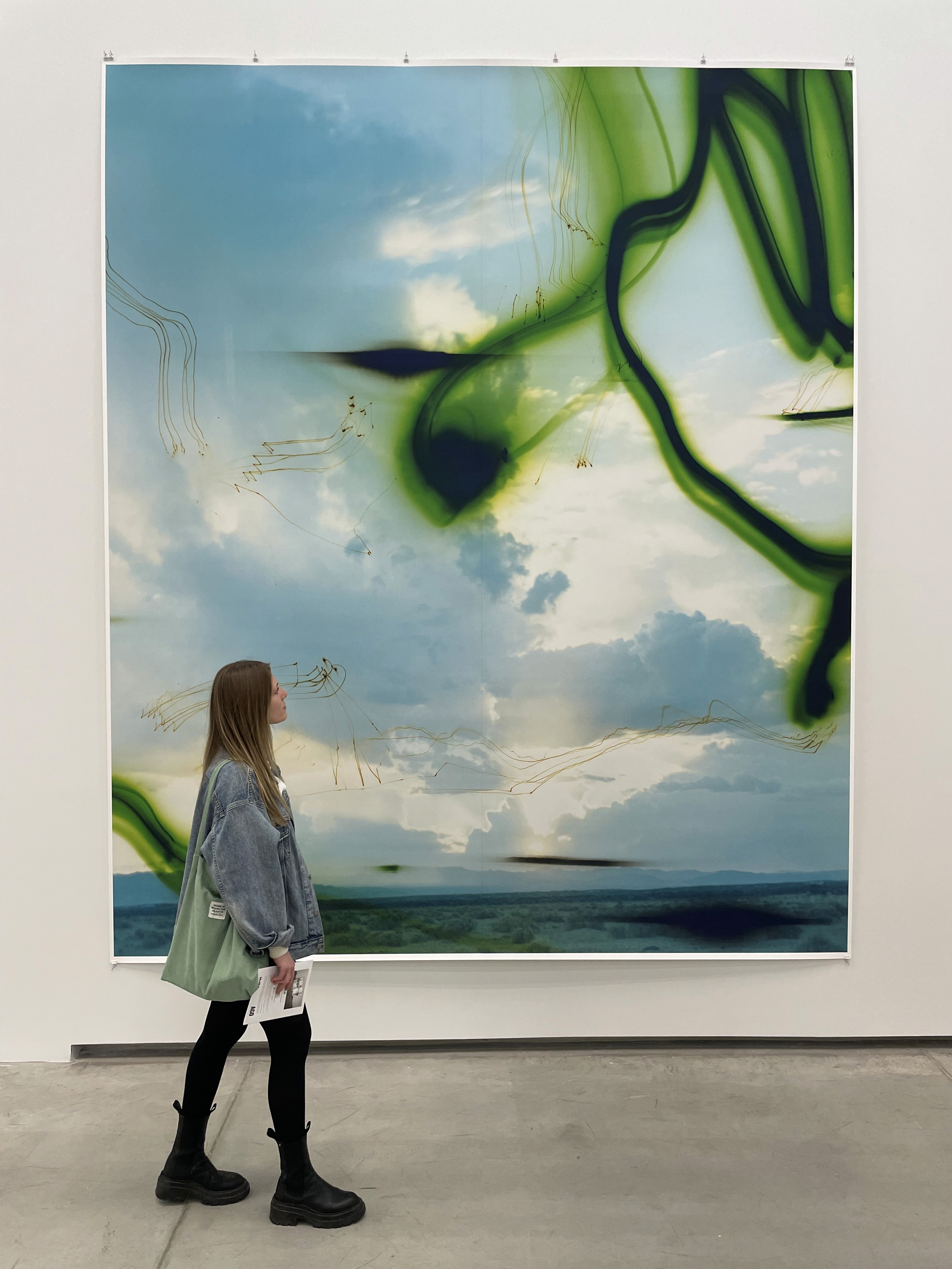 Riding a bicycle with V sign