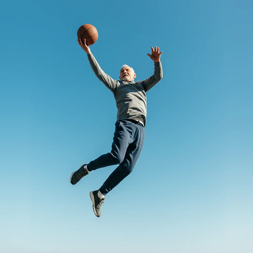 Man Jumping with Basketball