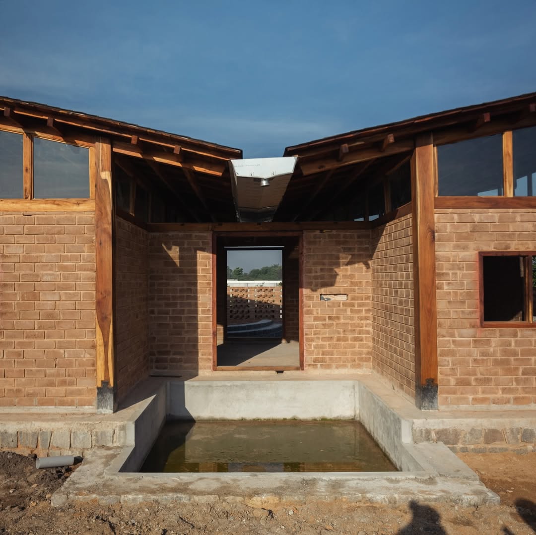 woman standing in front of white building