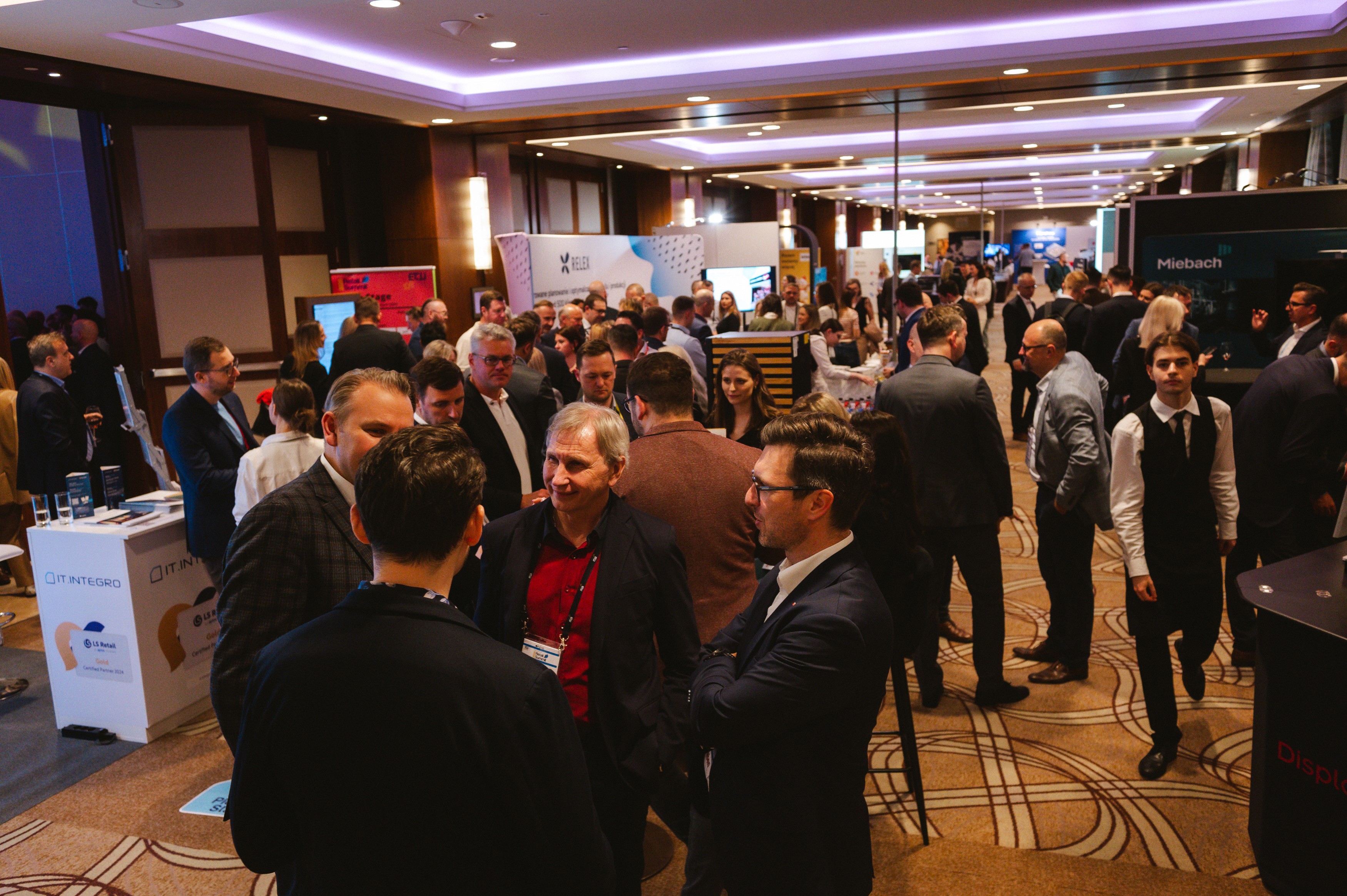 Professionals talking at a community gathering