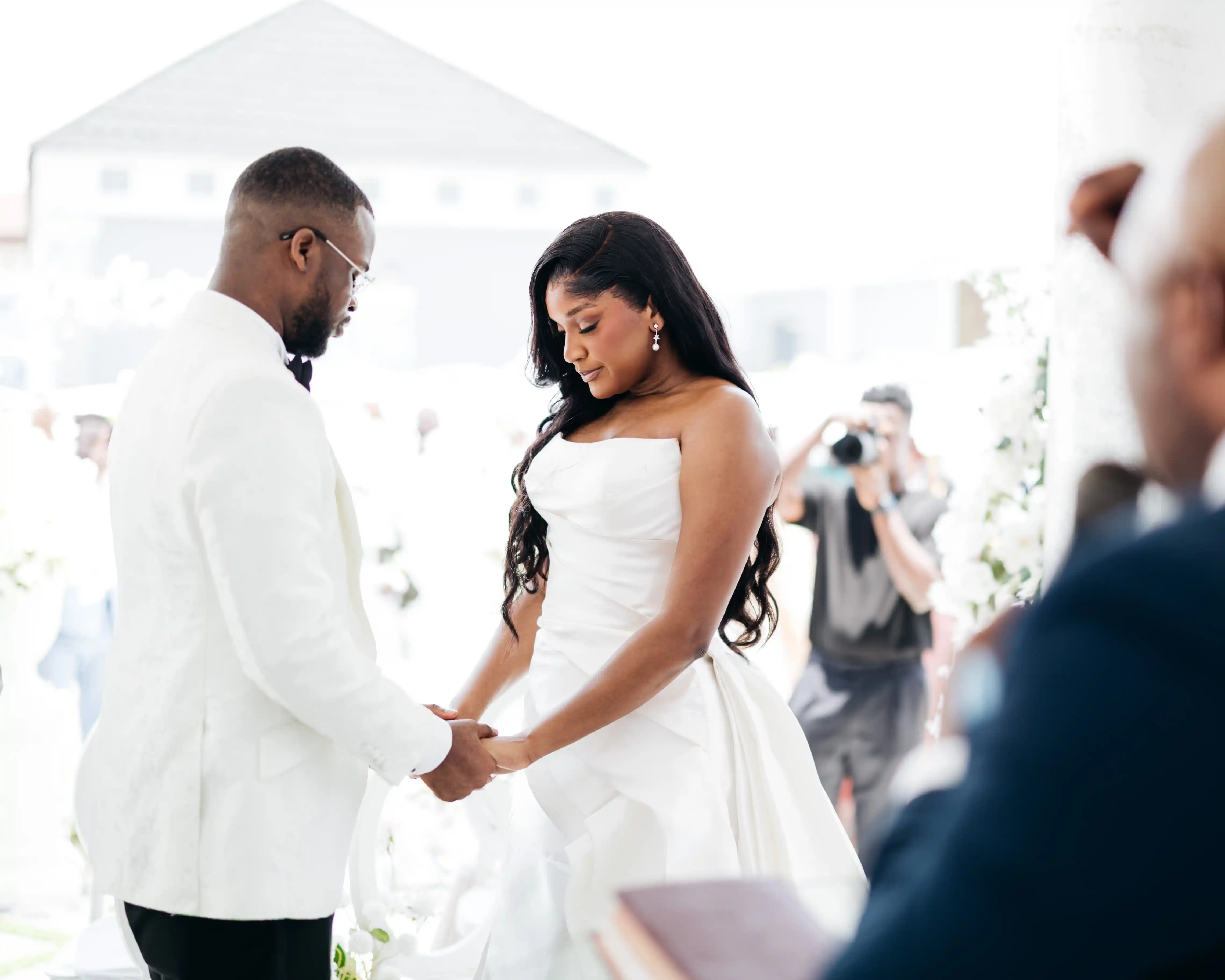 Bride and groom celebrating a luxury wedding coordinated by Victoria Brooks Events, a premium wedding planner in Nigeria.