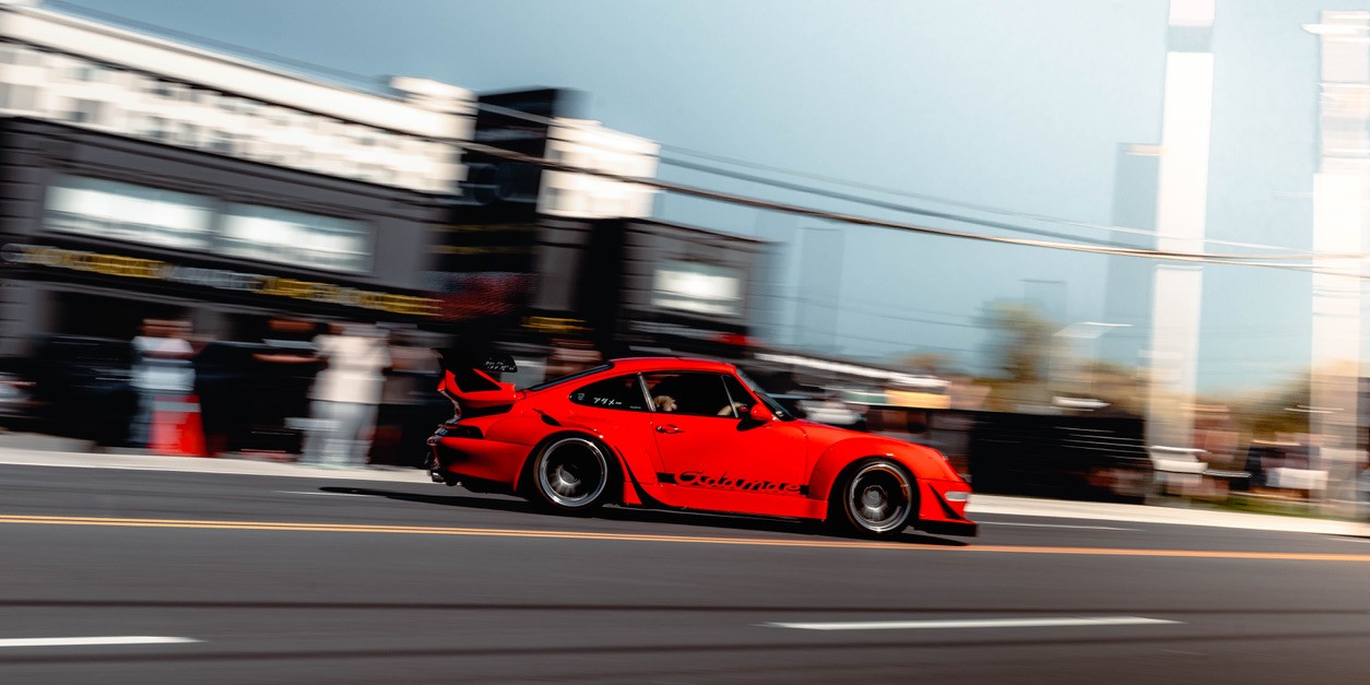 Fashion photoshoot with a woman posing in a dress