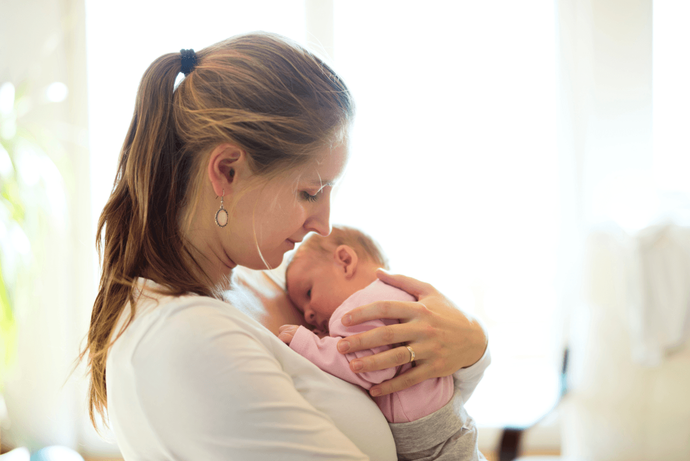 mother holding their newborn