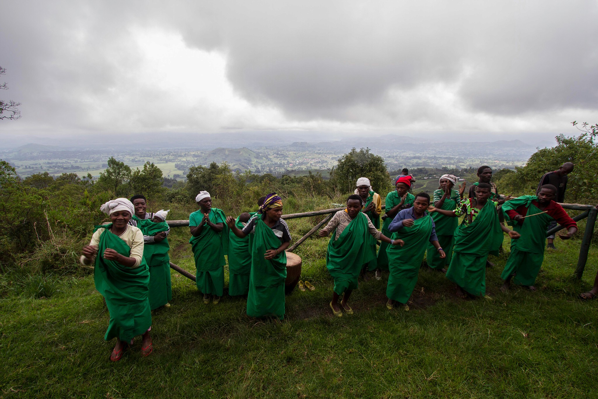Batwa people entertaining tourists in Bwindi Impenetrable National Park
