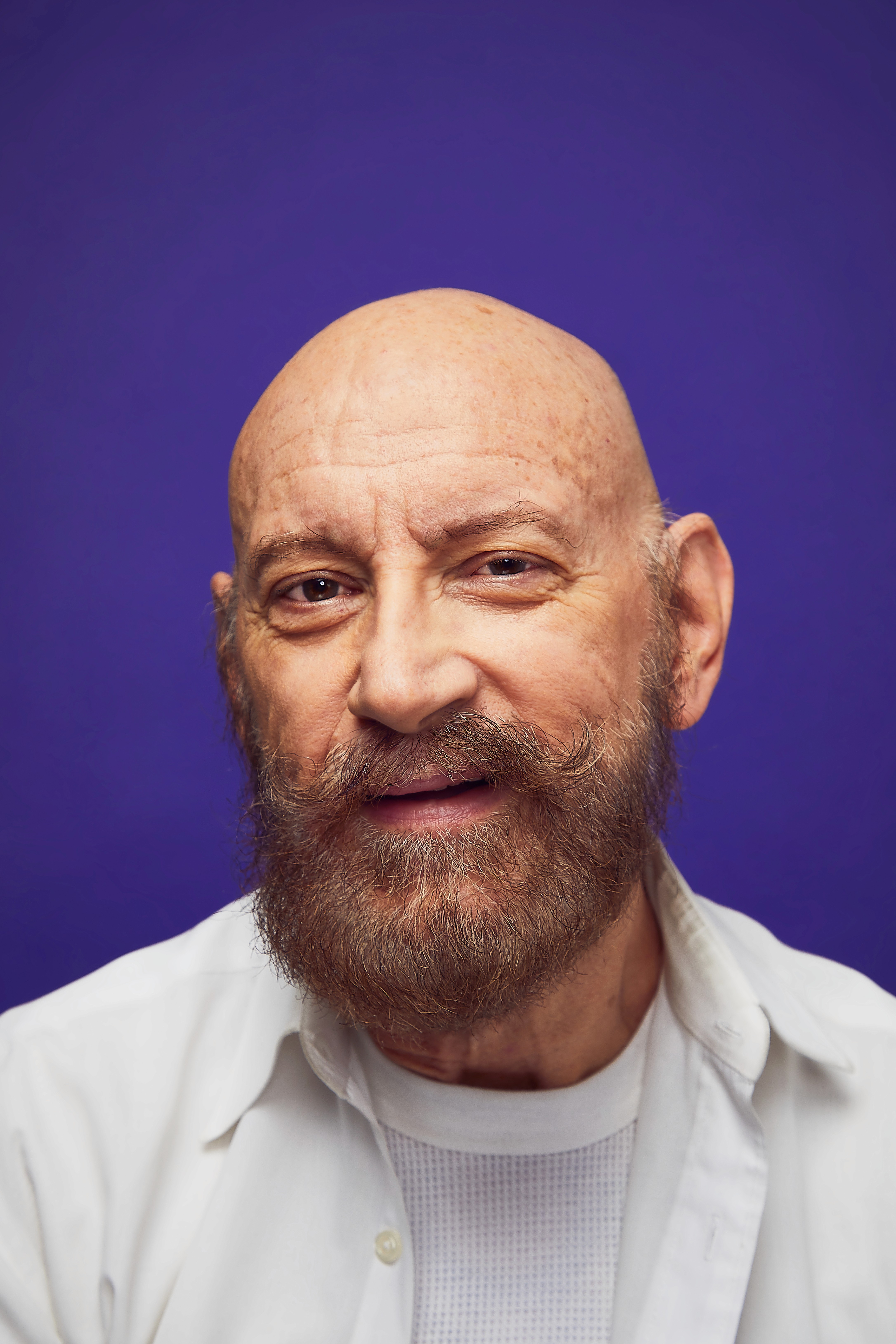 Streetside billboard with flyposters of the Batch.Works brand and illustrations