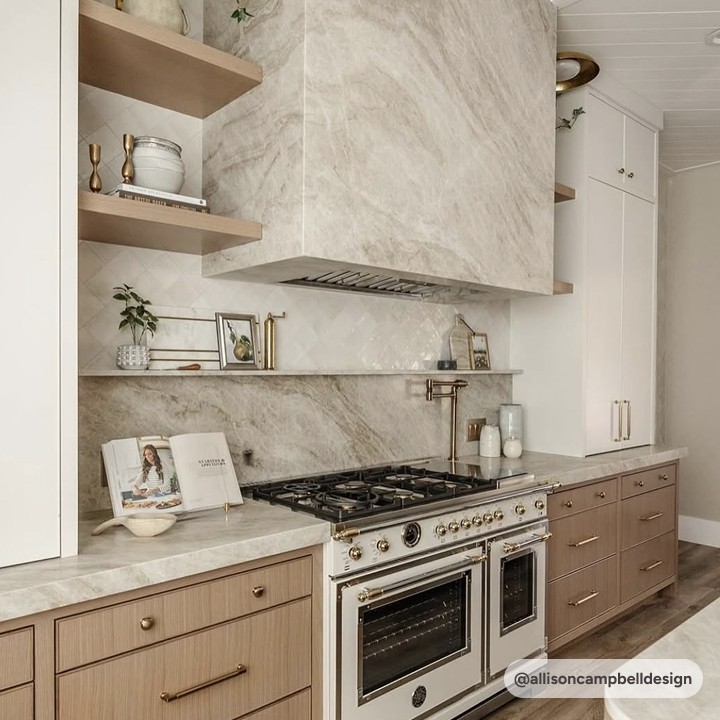 taj mahal quartzite countertop with natural white oak cabinets