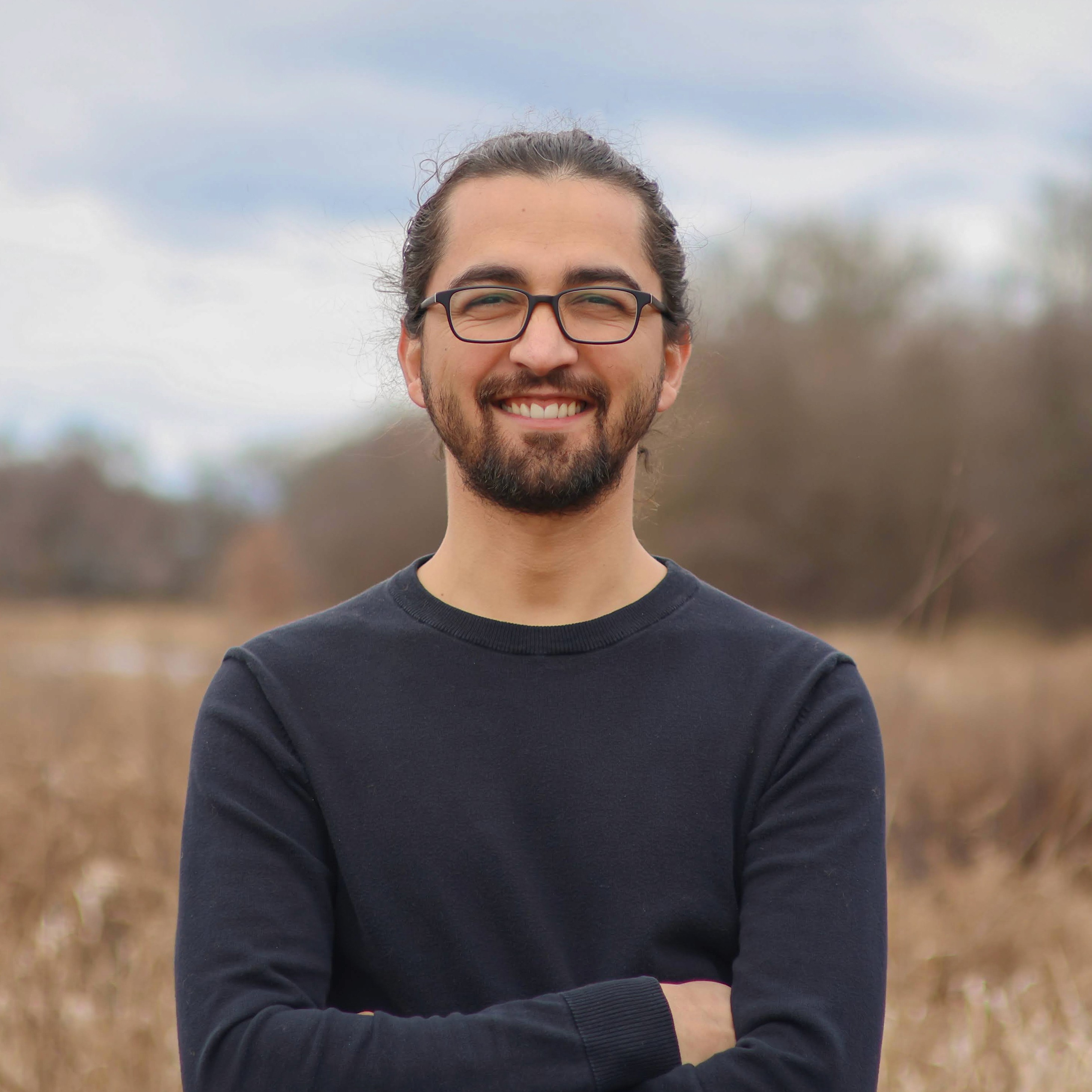person sitting in a chair in front of a man