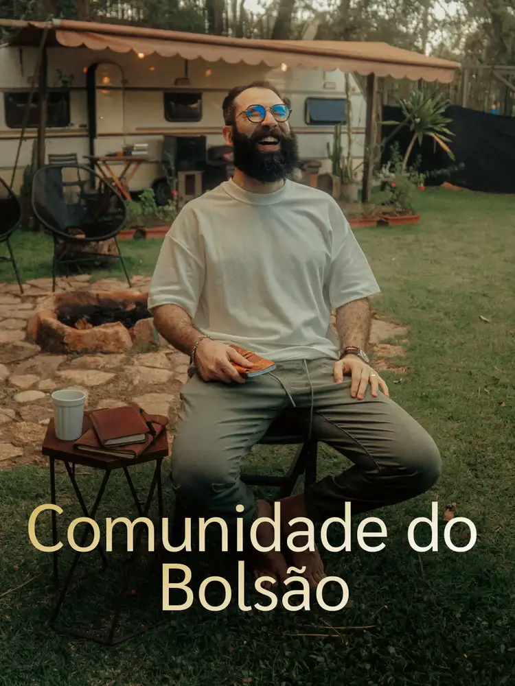 Stone kitchen with cabinets, exposed beam ceiling, terracotta floors.