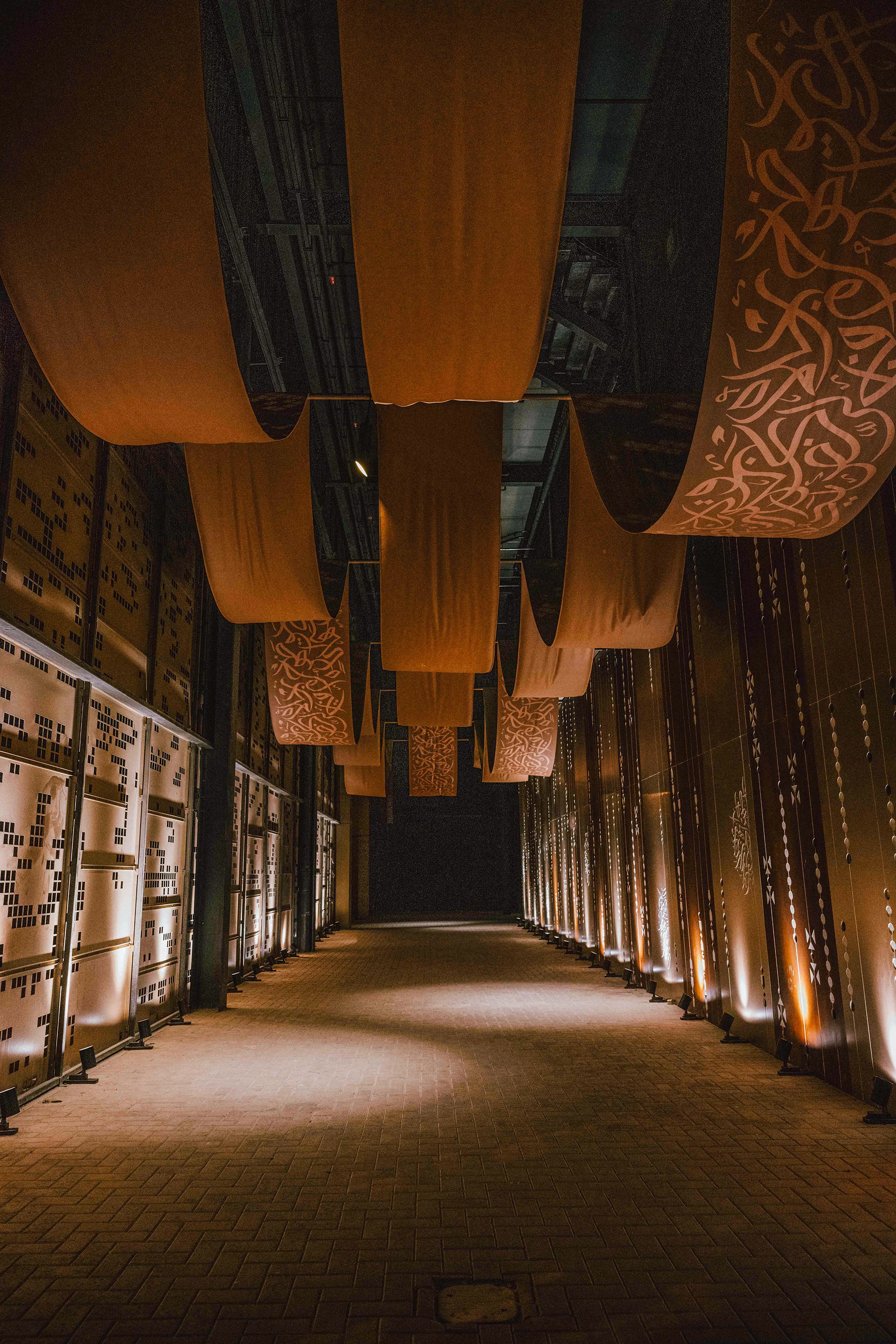 A mockup of a Macbook with the header of the website