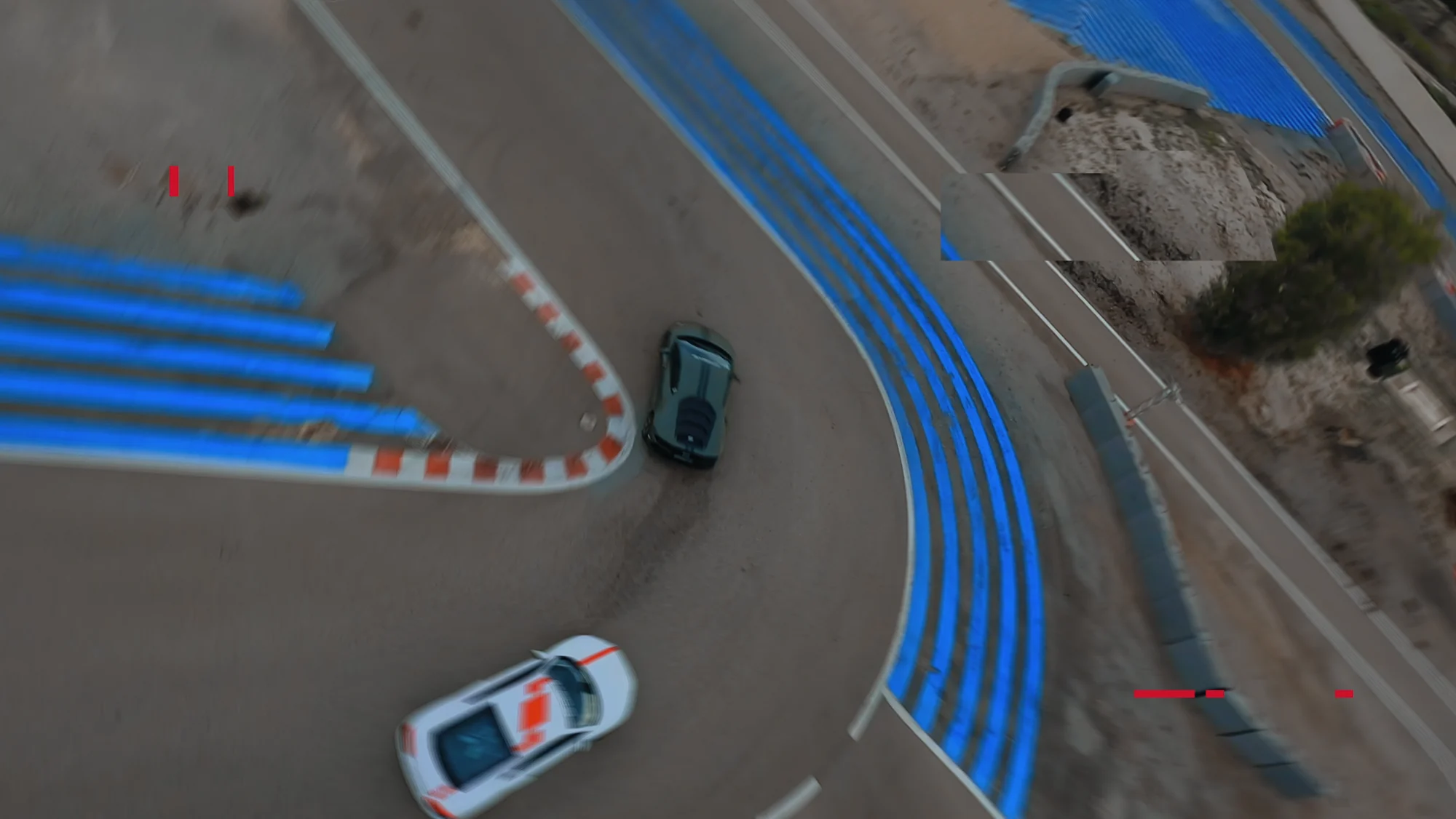 Aerial view of the Circuit Paul Ricard and its blue kerbs, from the Track Limit by GTDRIVE opening titles