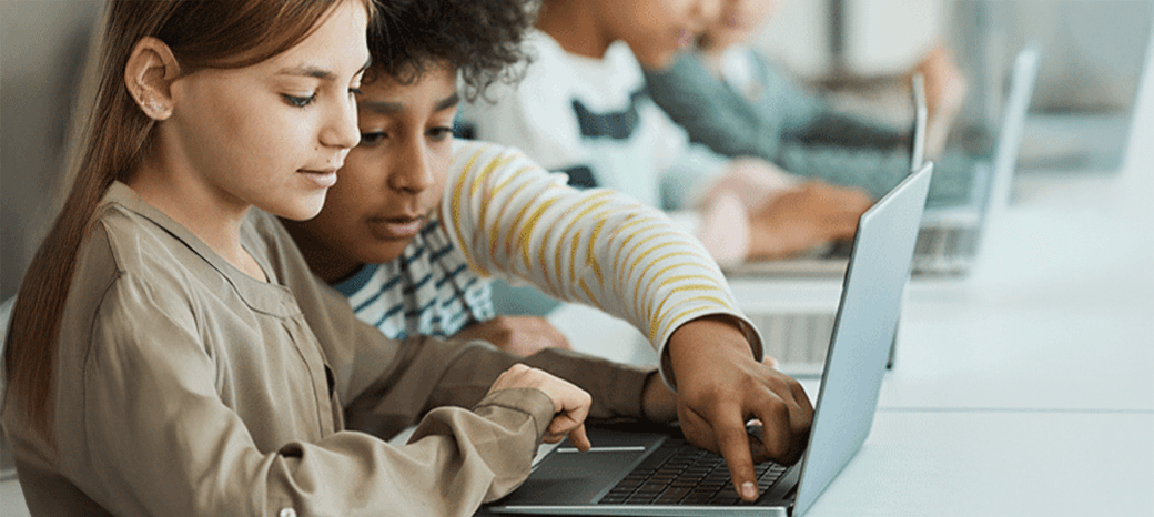 Kids developing programming skills in interactive after school coding and computer science program