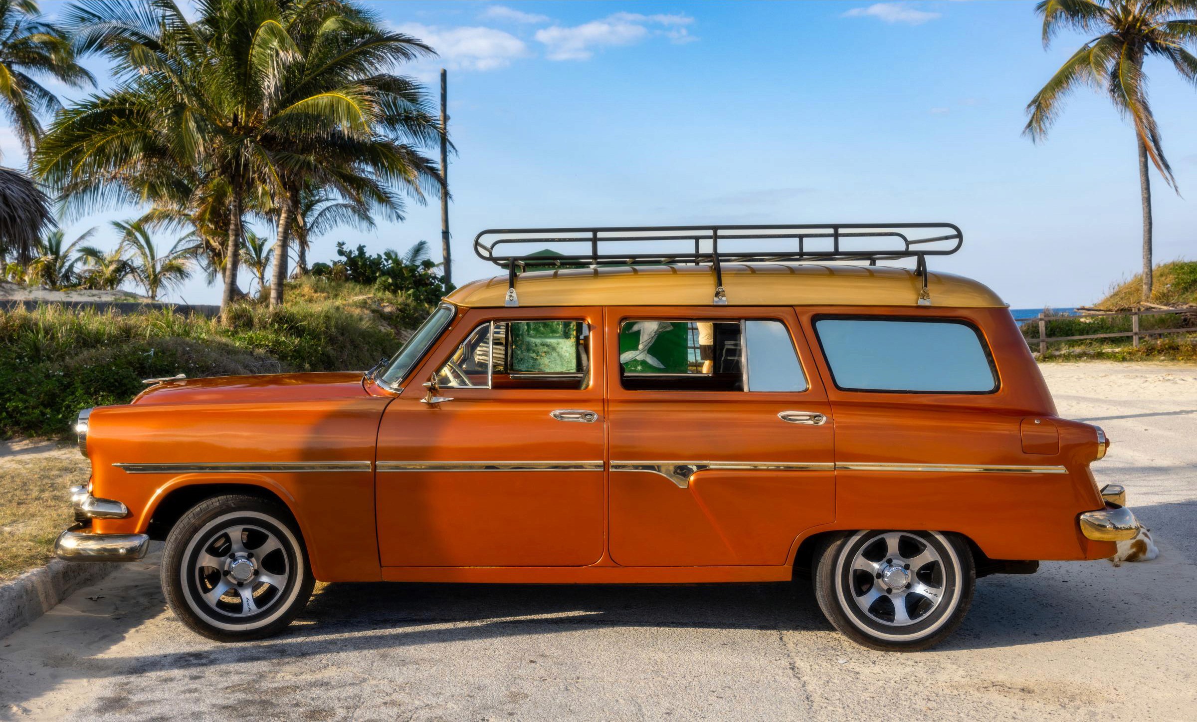 A beautiful 1954 Ford Customline Country Sedan Wagon at the entry to Playa MarAzul