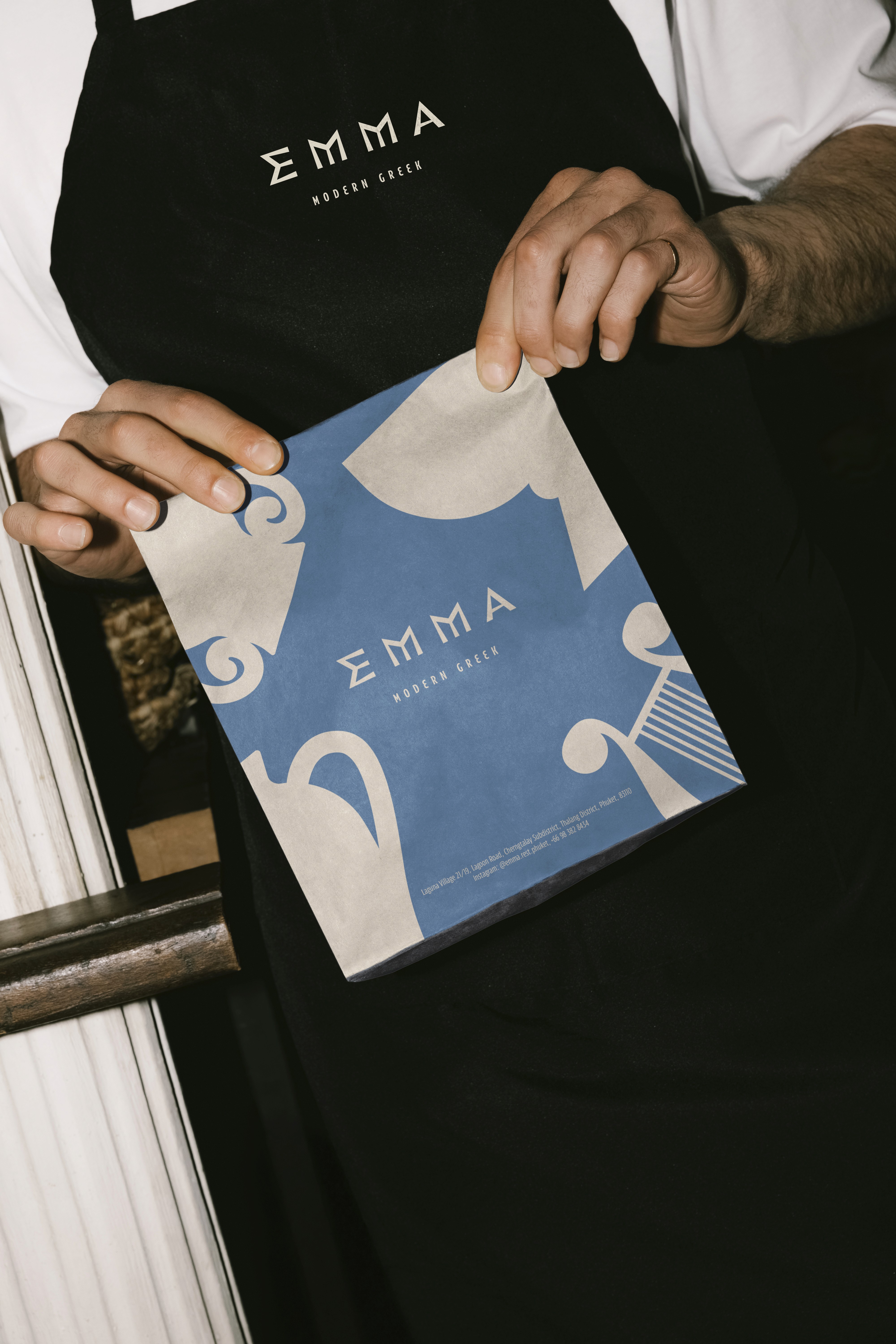 Streetside billboard with flyposters of the Batch.Works brand and illustrations