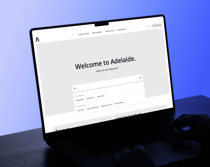 Wireframes displayed in a laptop mock-up.