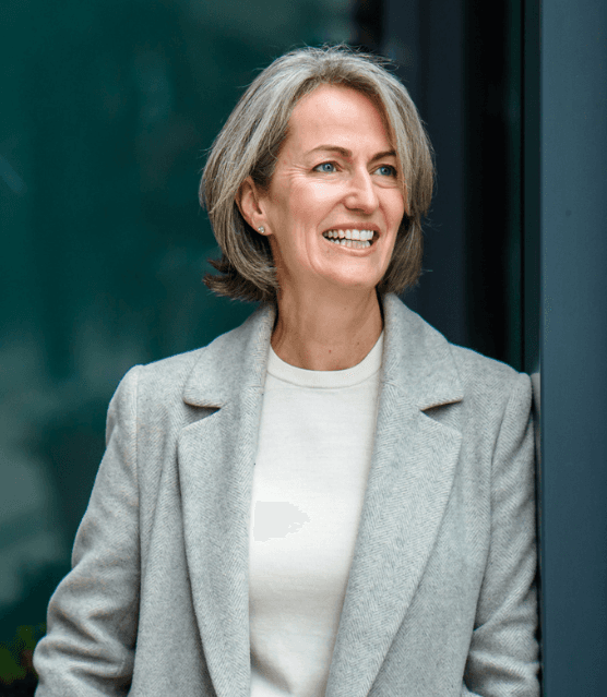 kate sitting with her tea cup in hand