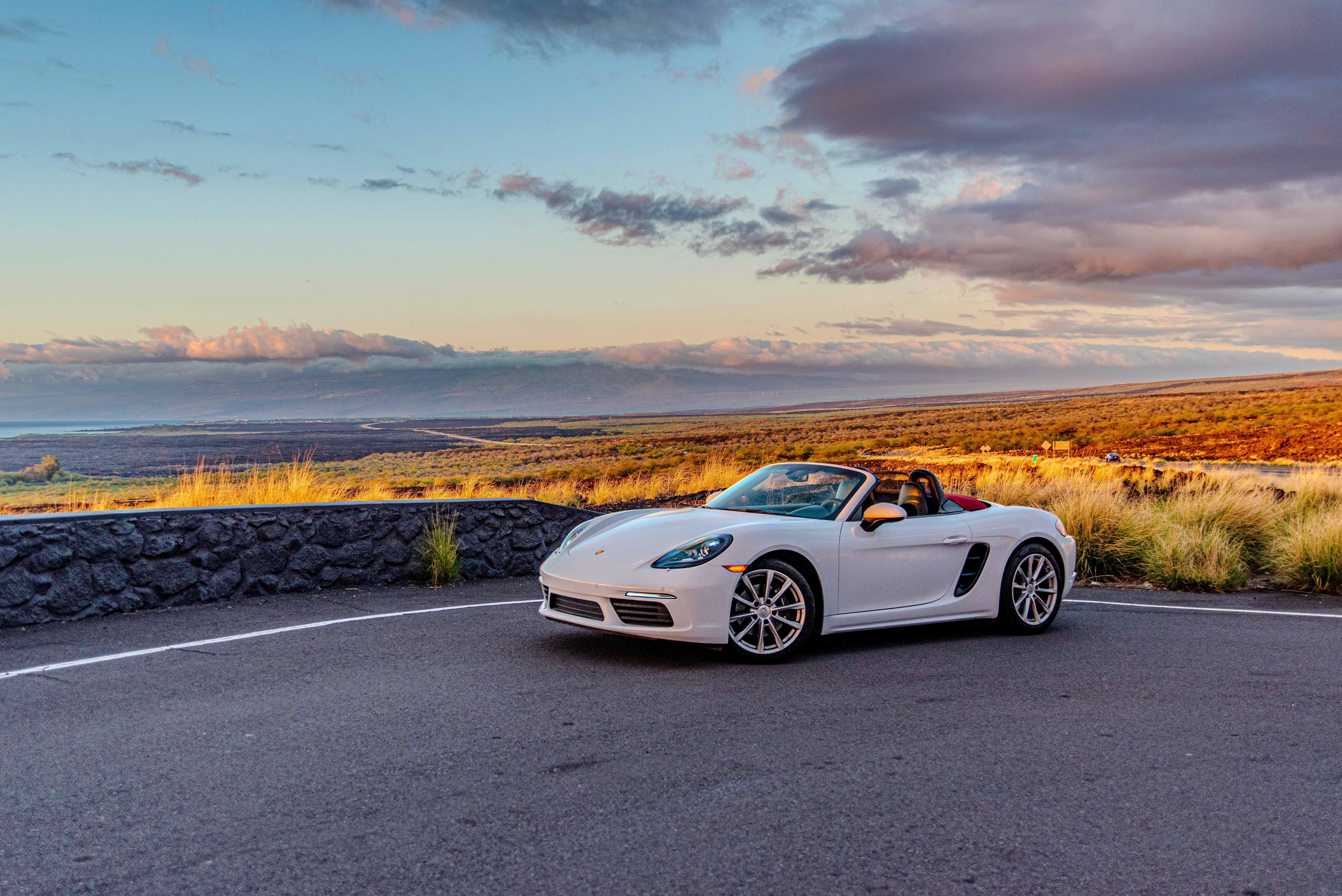 White Porsche Boxster Under Sunset Hawaii Big Island For Rent
