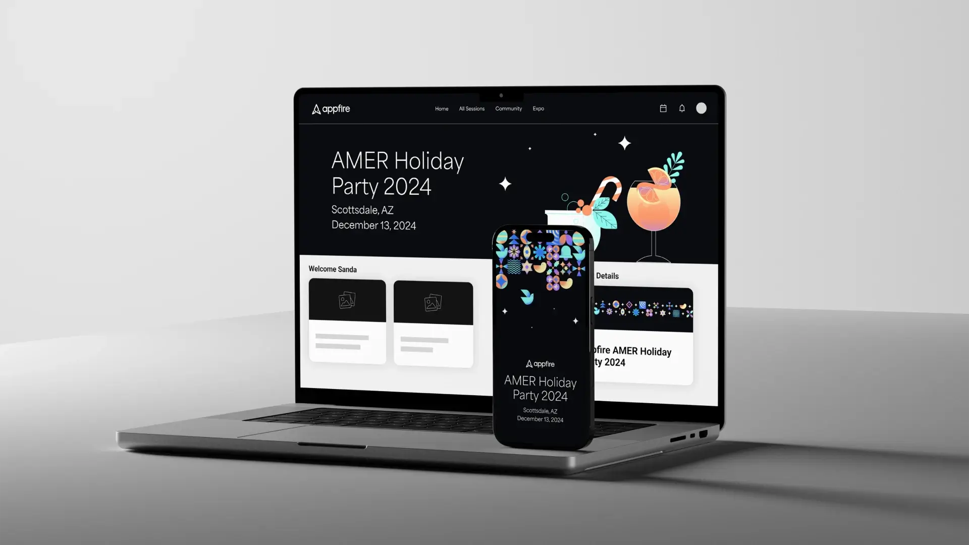 A macbook and iphone sitting on a gray table displaying holiday based event pages