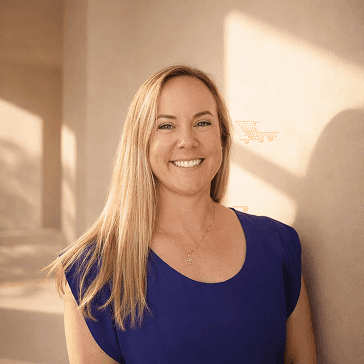 Dr. Bradi, healthcare professional smiling in clinic environment