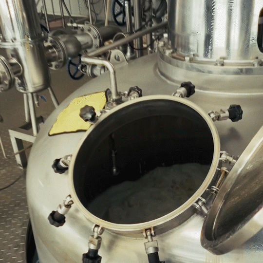 Video of microbial fermentation inside a large bioreactor converting feedstock into natural polymers