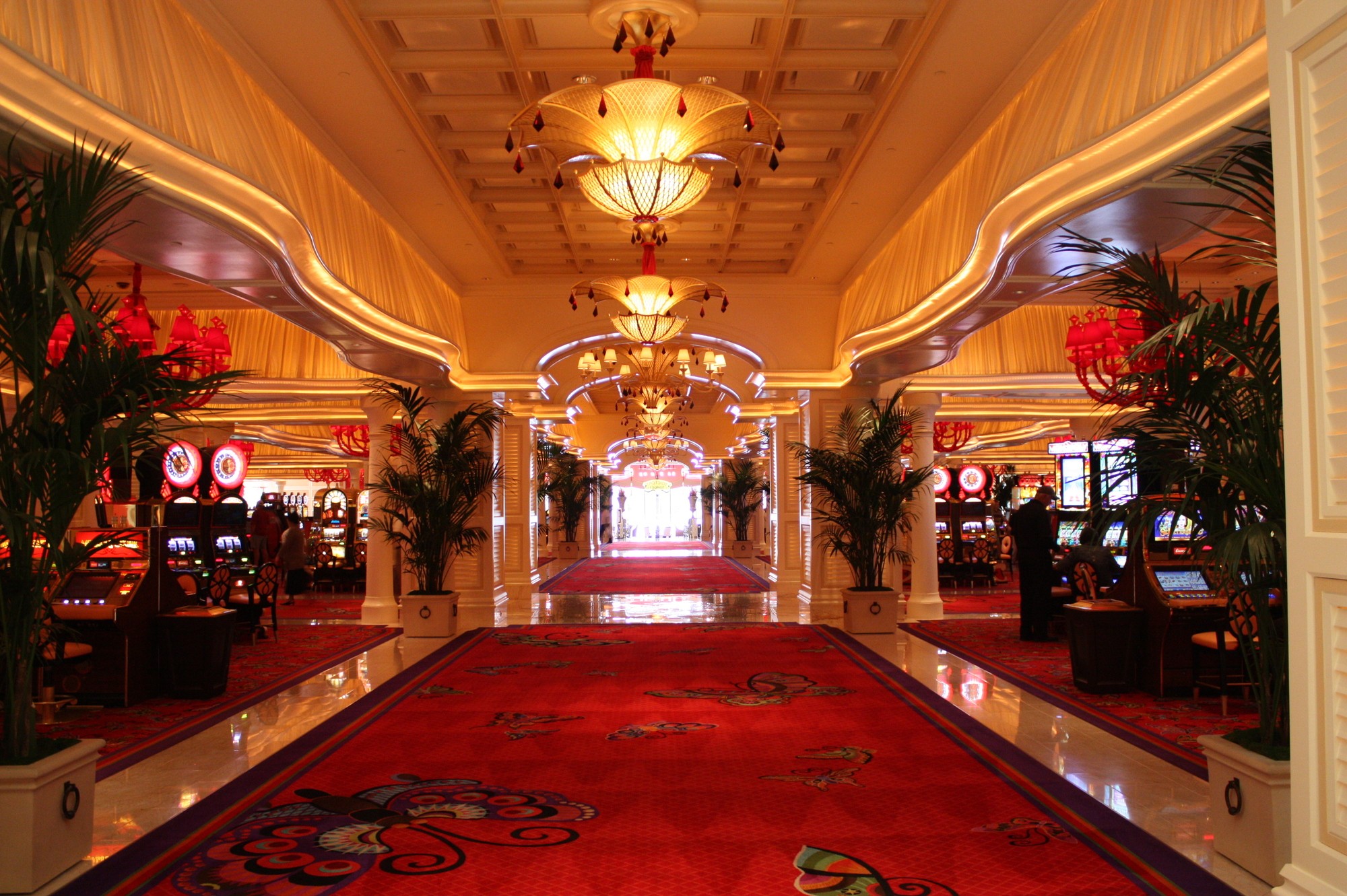 A wooden walkway leading to a body of water