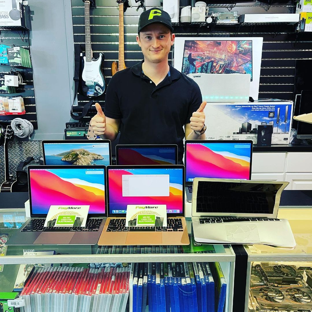 Staff member at PayMore store