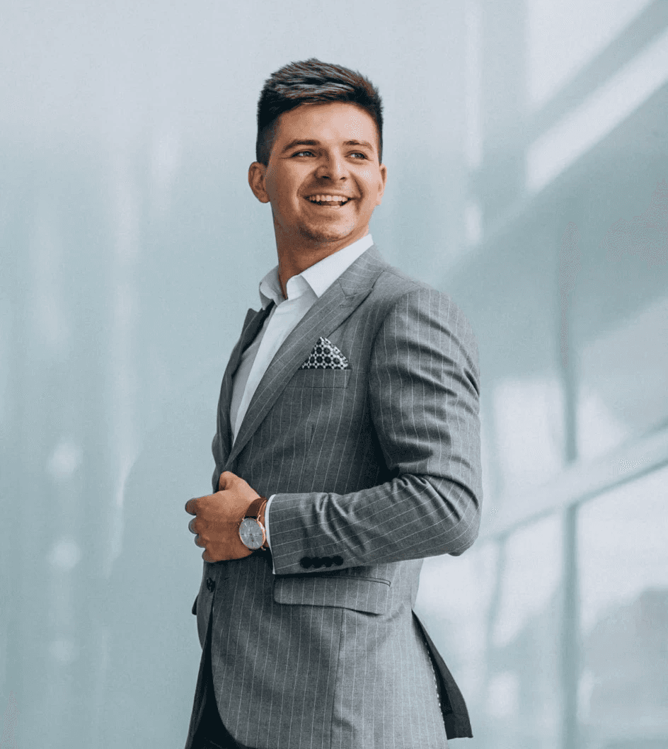 woman sitting around table holding tablet