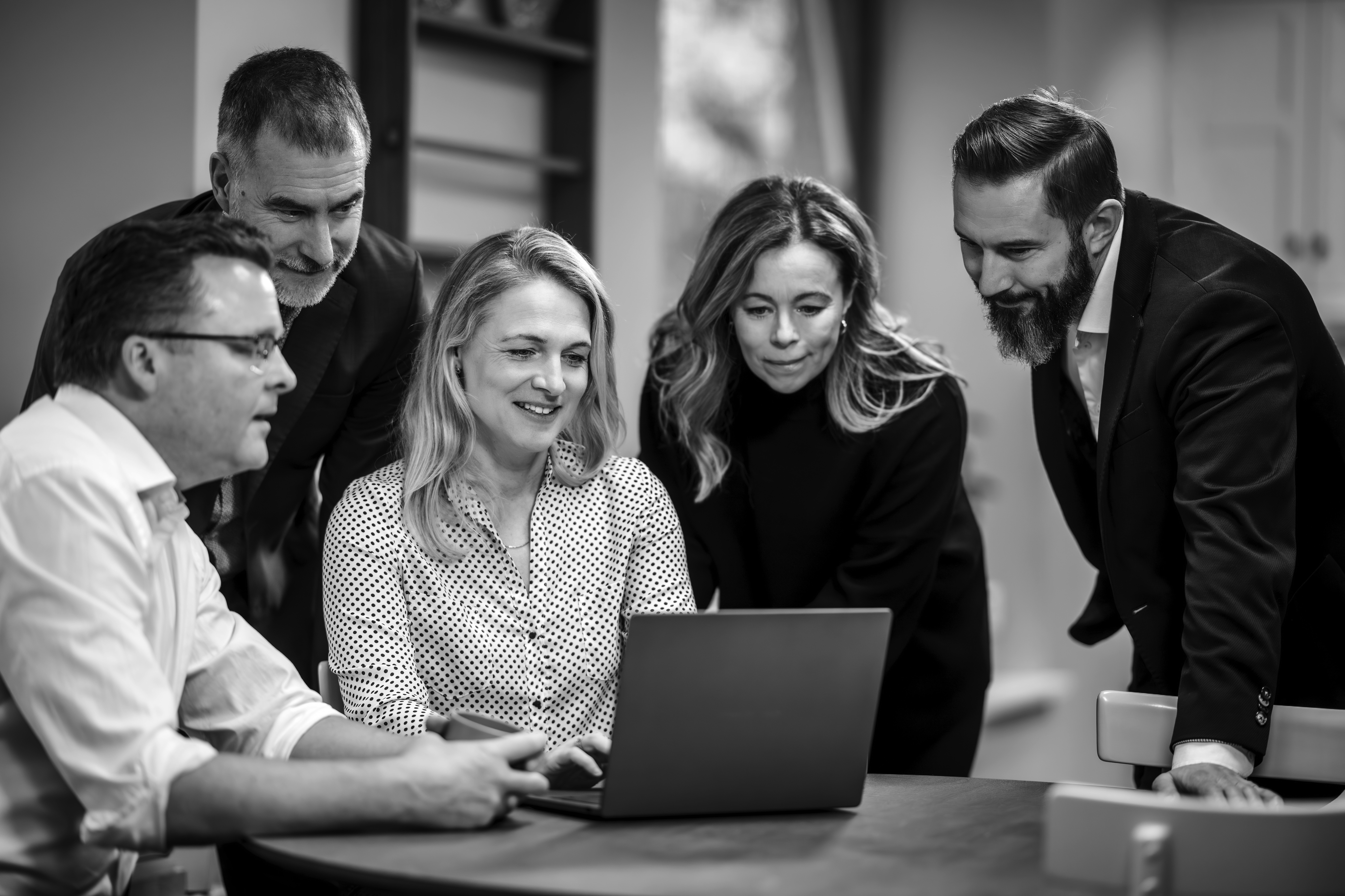 a man in a yellow shirt is on a red track