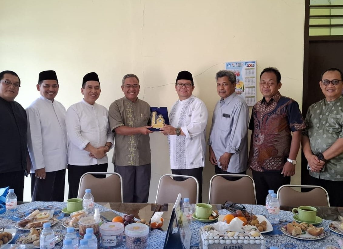 a group of young men sitting next to each other