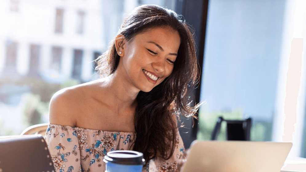 A Filipino small business owner on her laptop