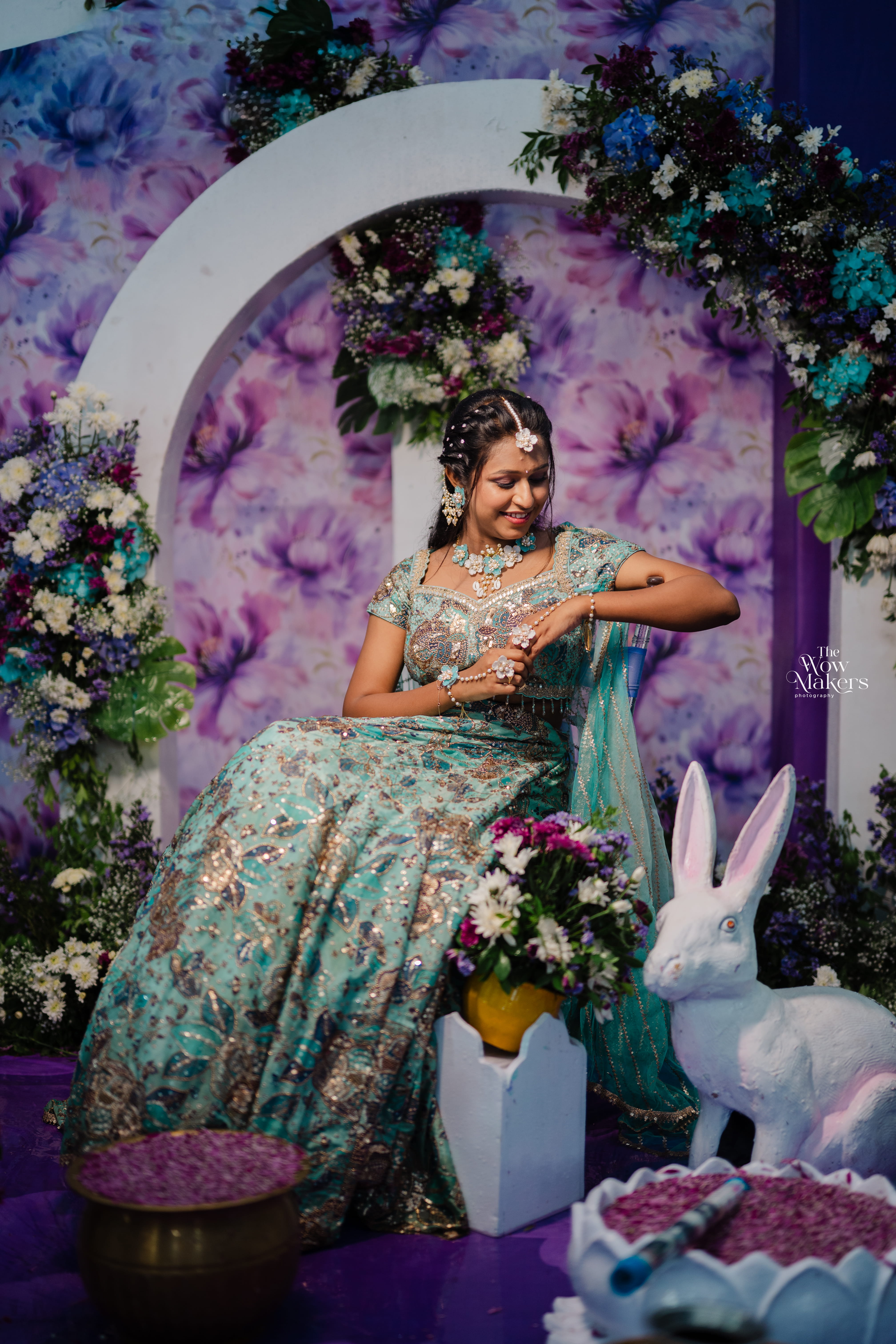 Wedding day photo collage with bride and groom in maroon and gold attire, jewelry and ring close-ups, captured by Wow Makers in Hyderabad, India."