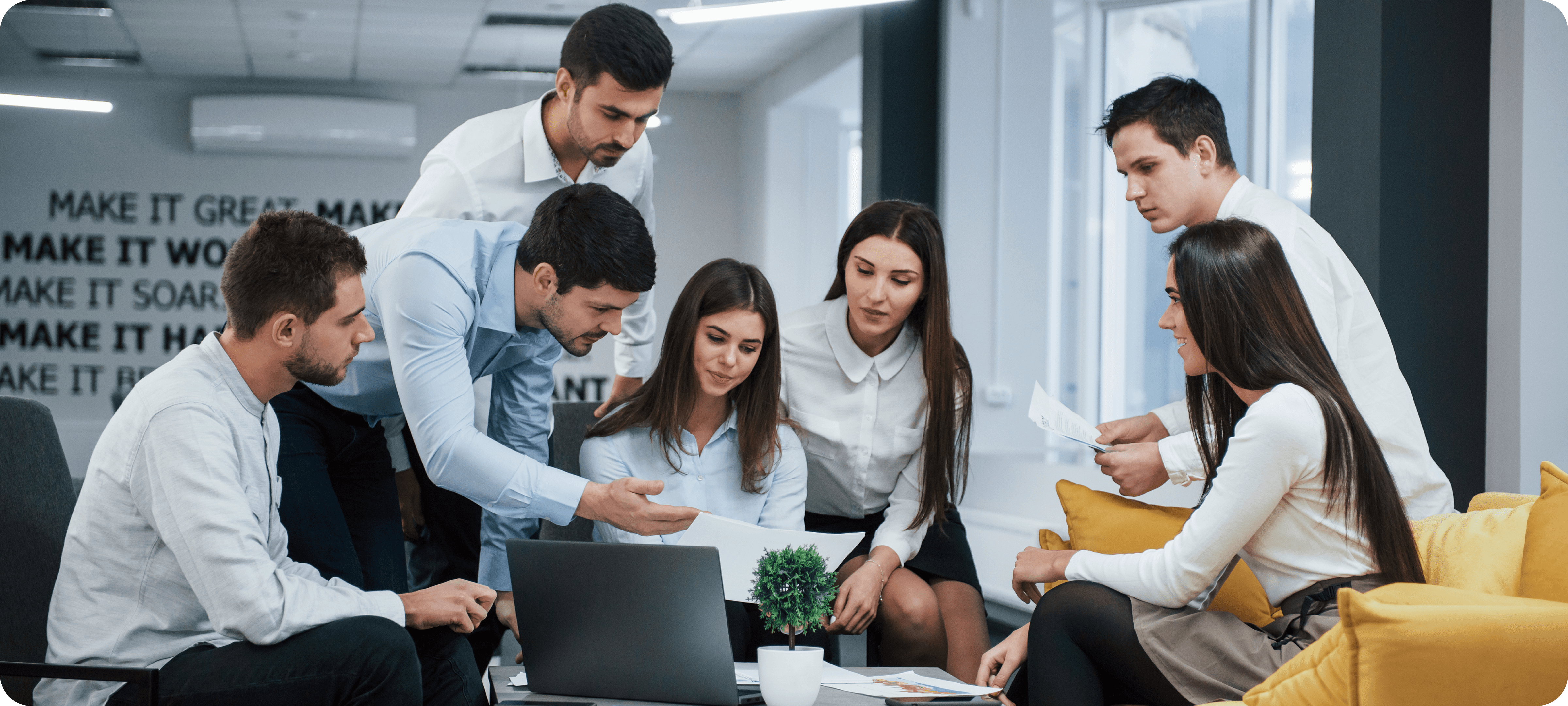 Team meeting around a table in office setting
