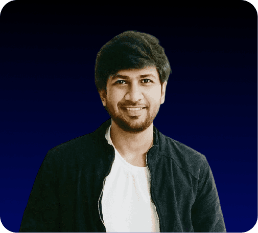 A young boy in formal attire looks forward.