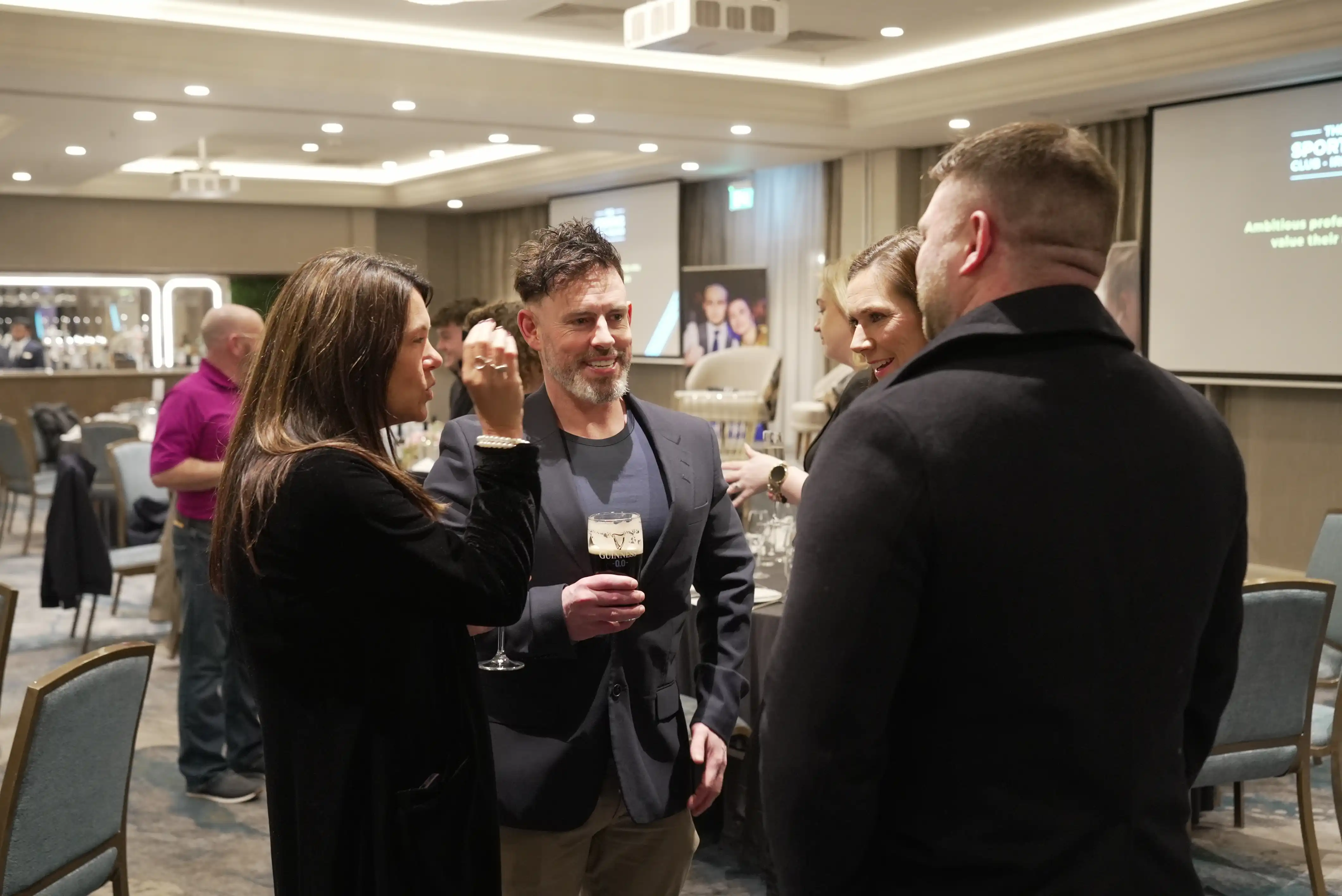 Members networking at a Sporting Club Ireland event
