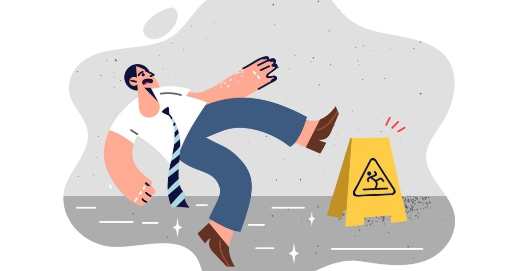 business man slipped and fell on the ground