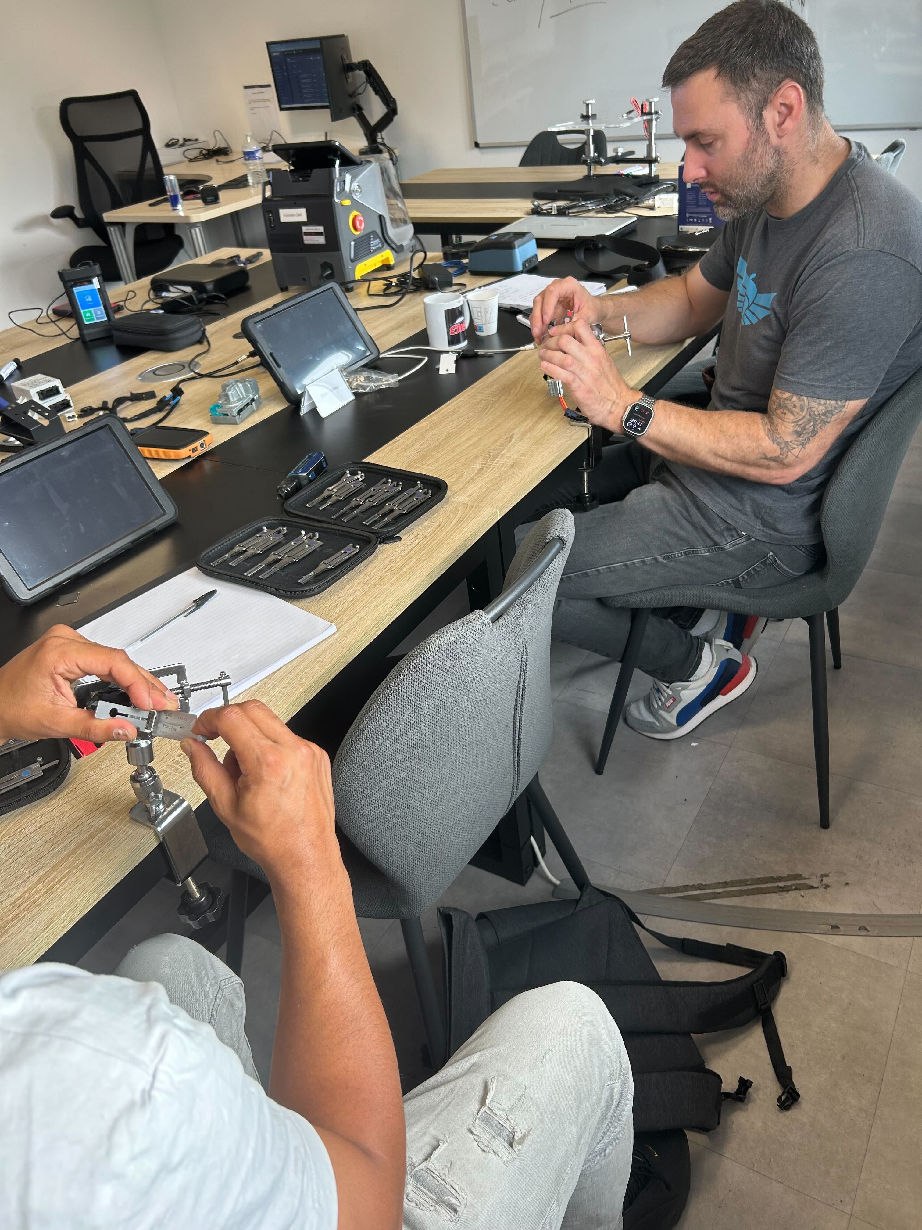 A man stading with Surfboard