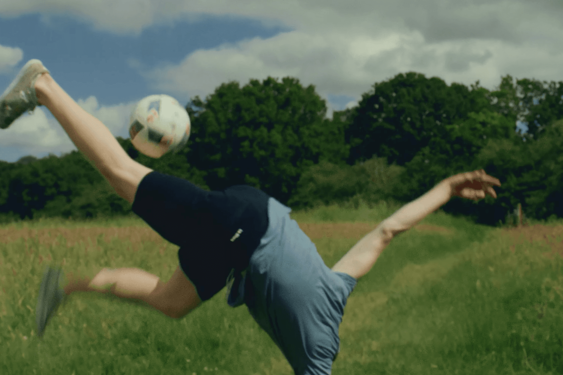 Model wearing luxurious white satin dress with pearls for London Fashion Awards