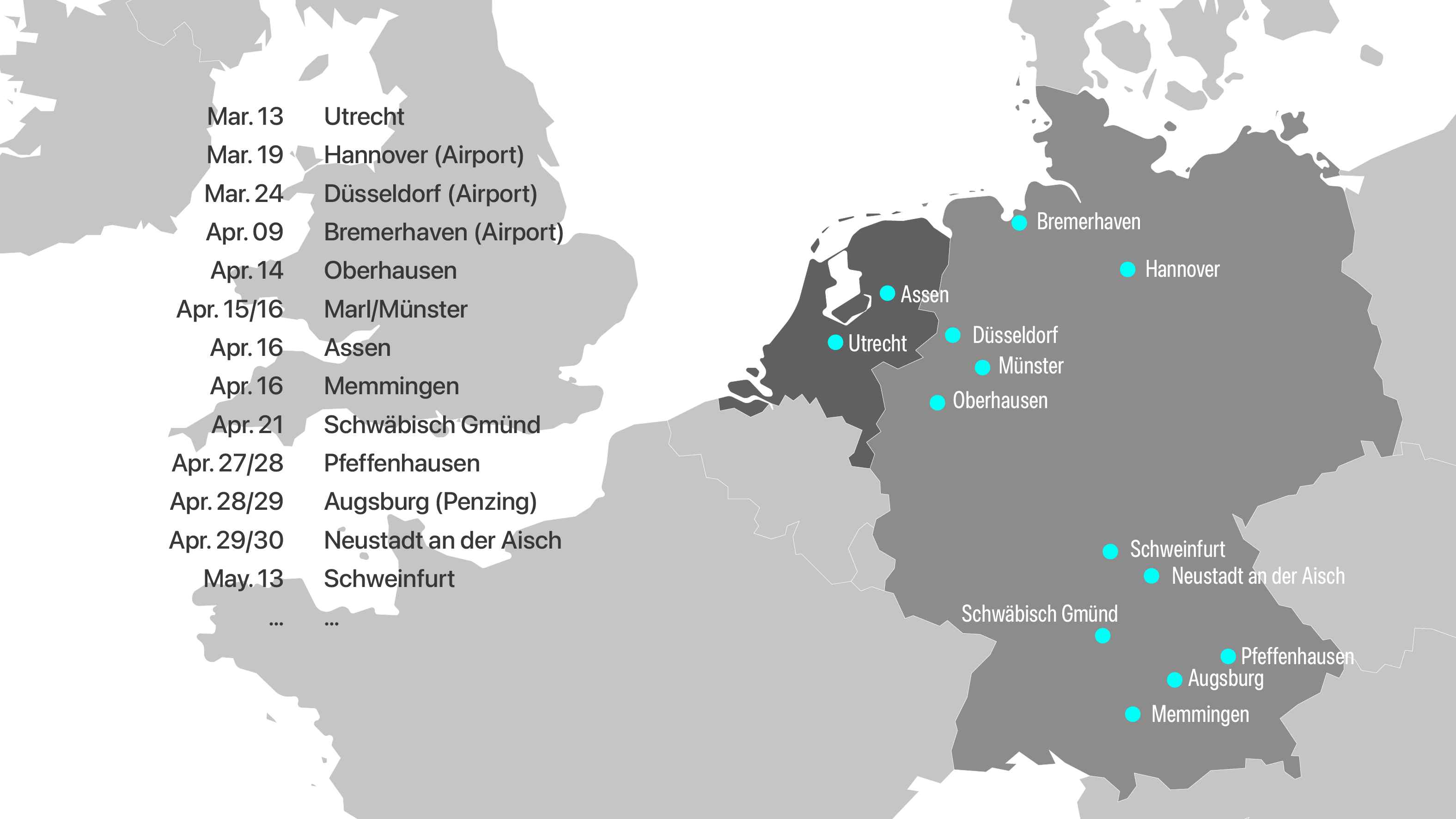 two people looking at a tablet and smiling