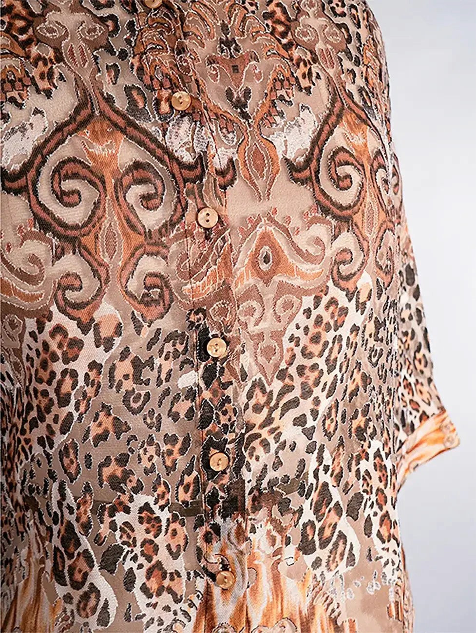 Vintage mixed animal print blouse with 3/4 sleeves.