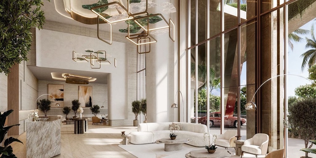 At 31 Above by Beyond, the lobby is beautifully decorated in gold and white, offering a welcoming ambiance.