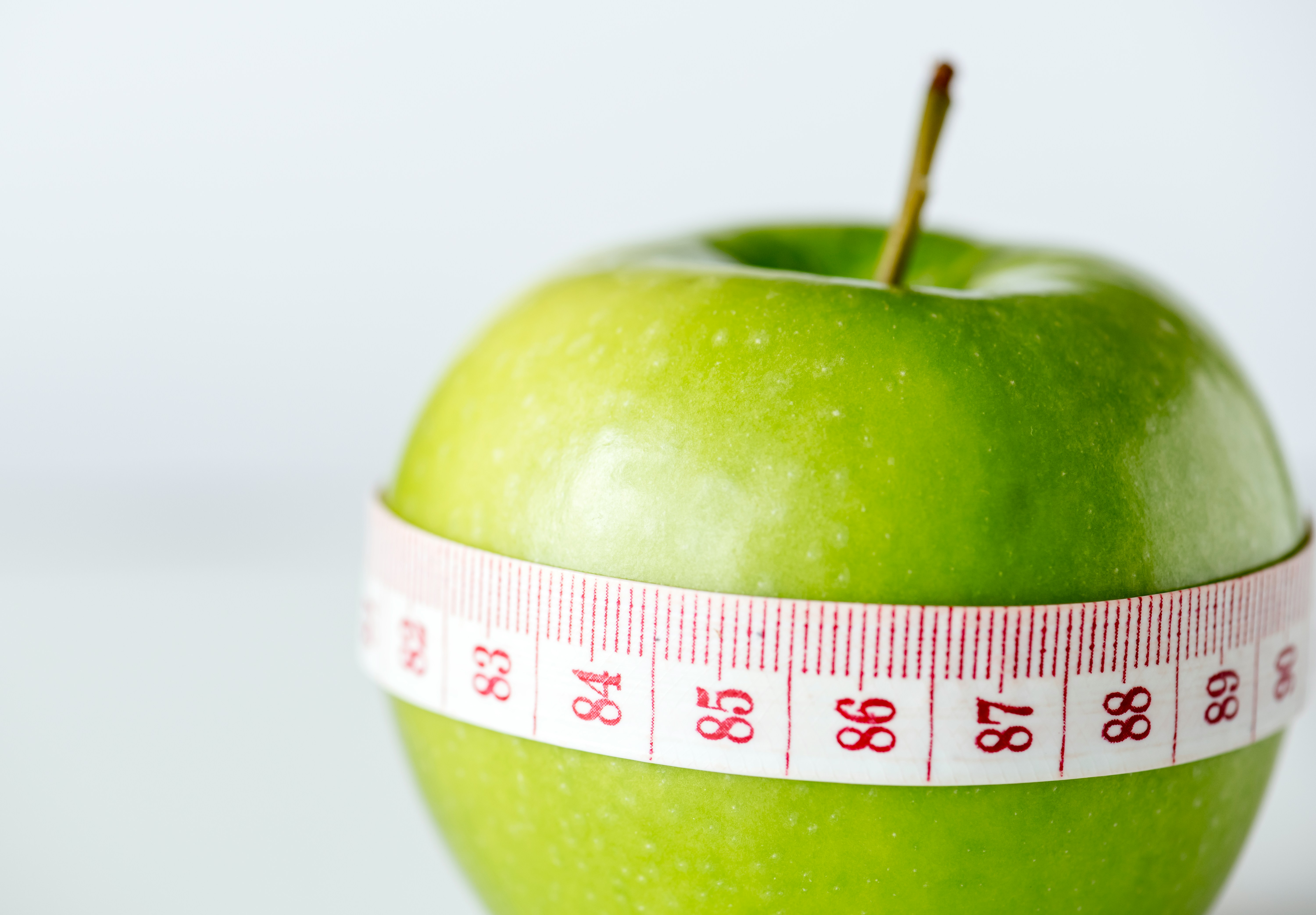 a square button sitting on top of a circular table