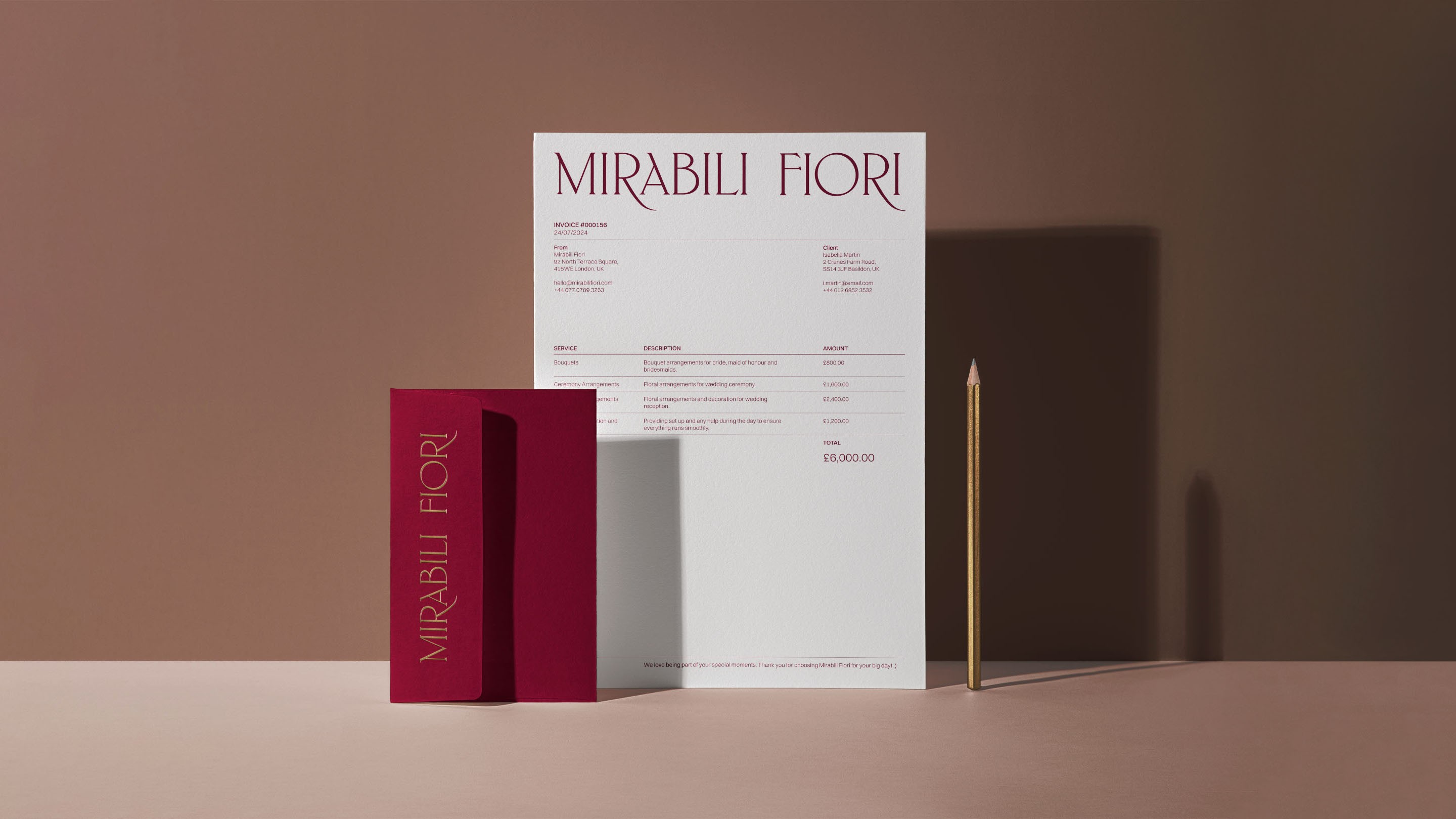 Mirabili Fiori Invoice and embossed envelope on neutral surface