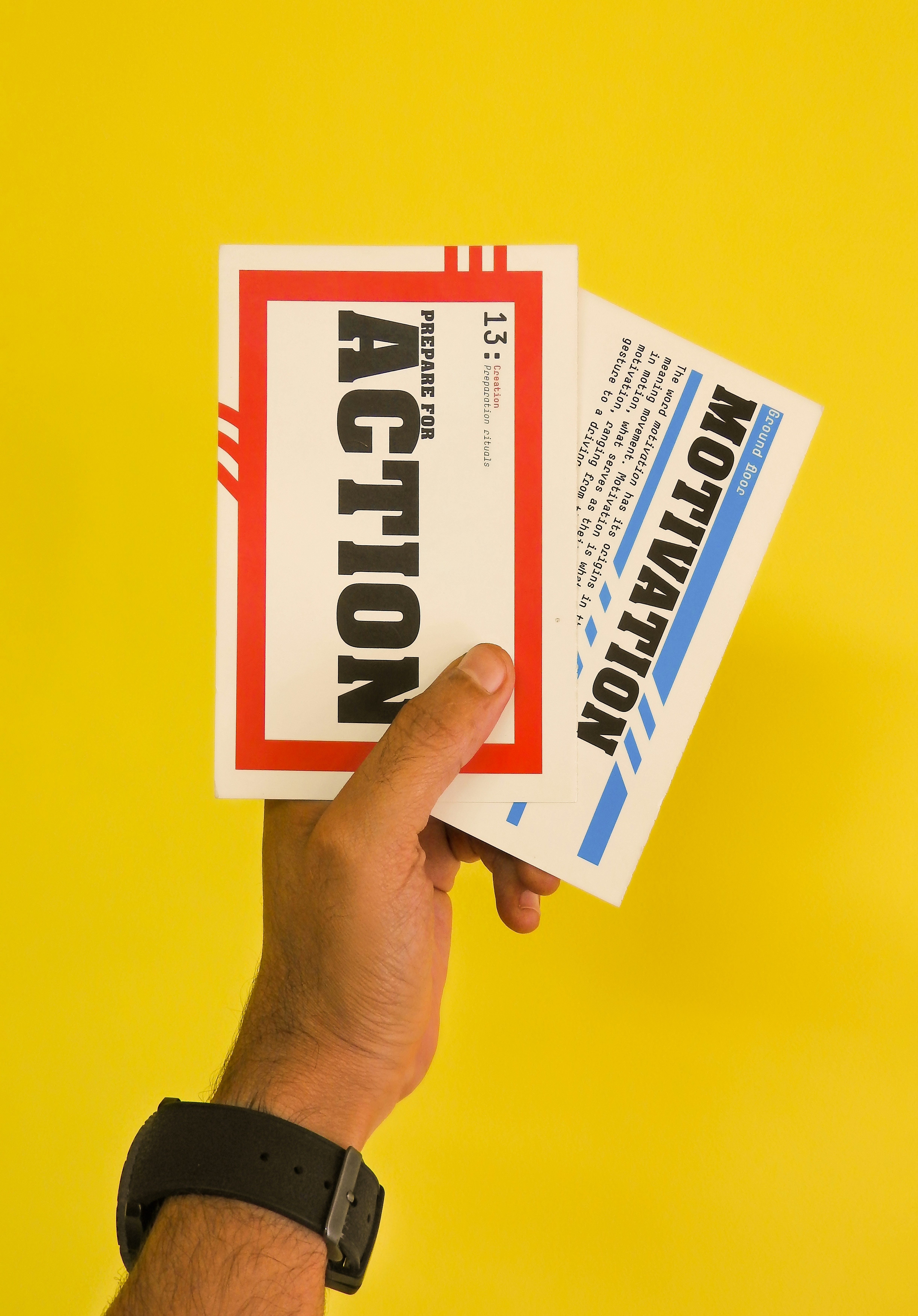 person holding white and red box