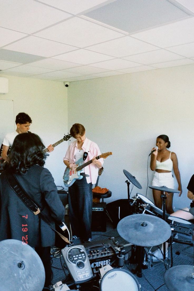 men sitting in front of their laptop computer