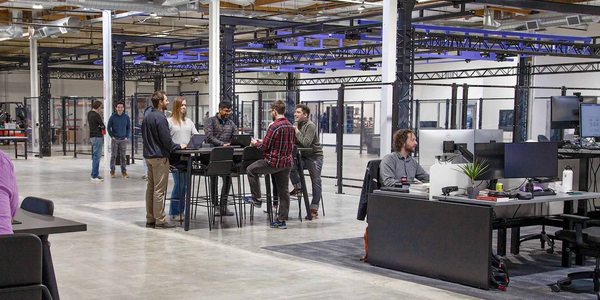 Elf woman in white dress raising hands by the river