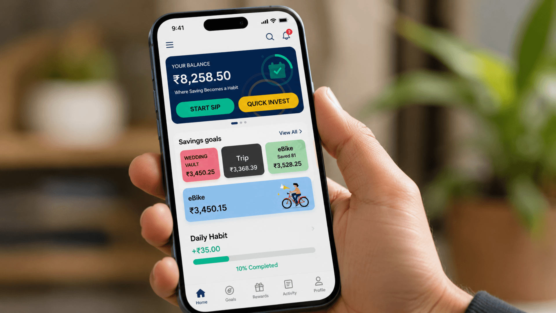 Smartphone screen showing goal-based savings app with progress tracker. 