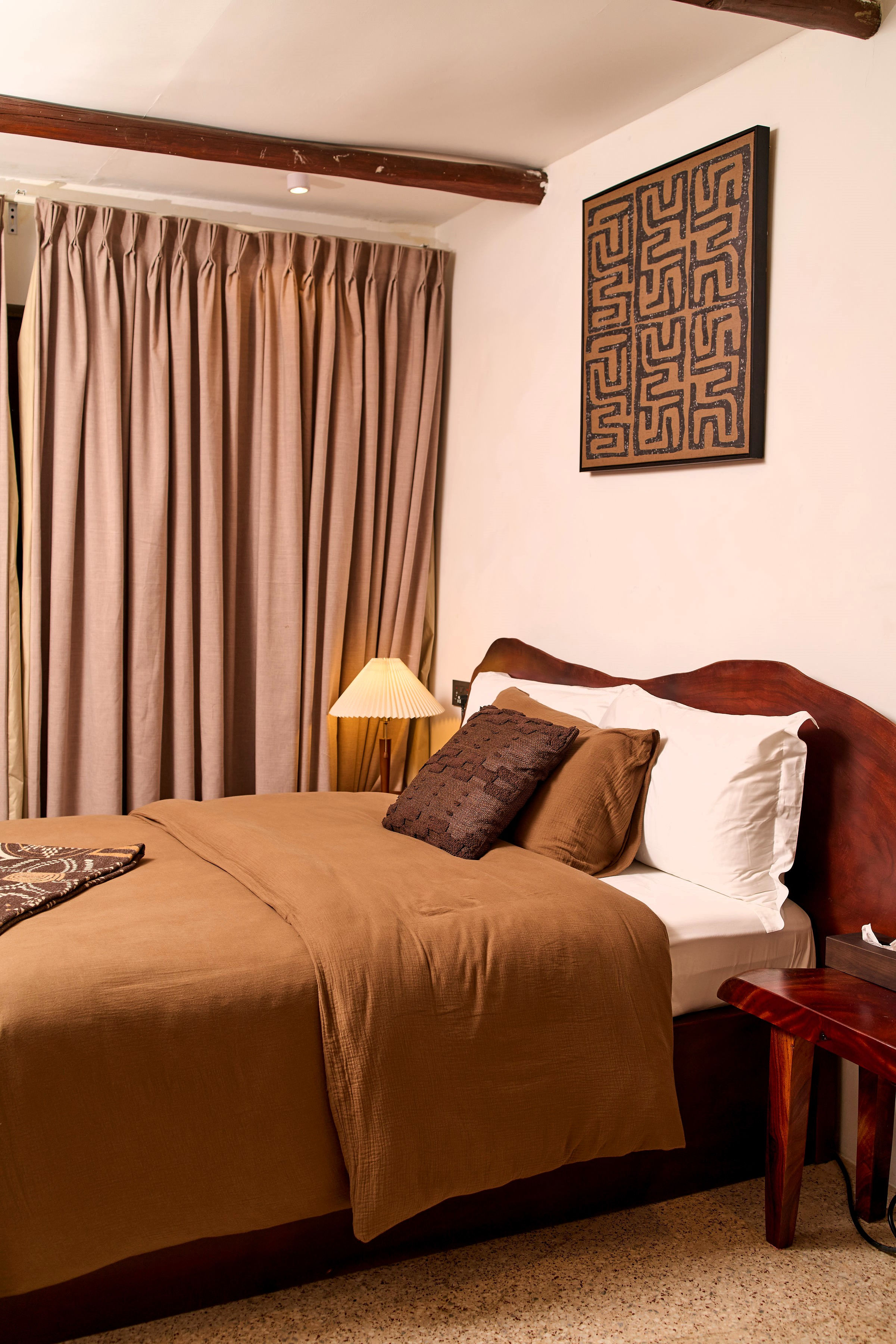 closeup of bed with curtain