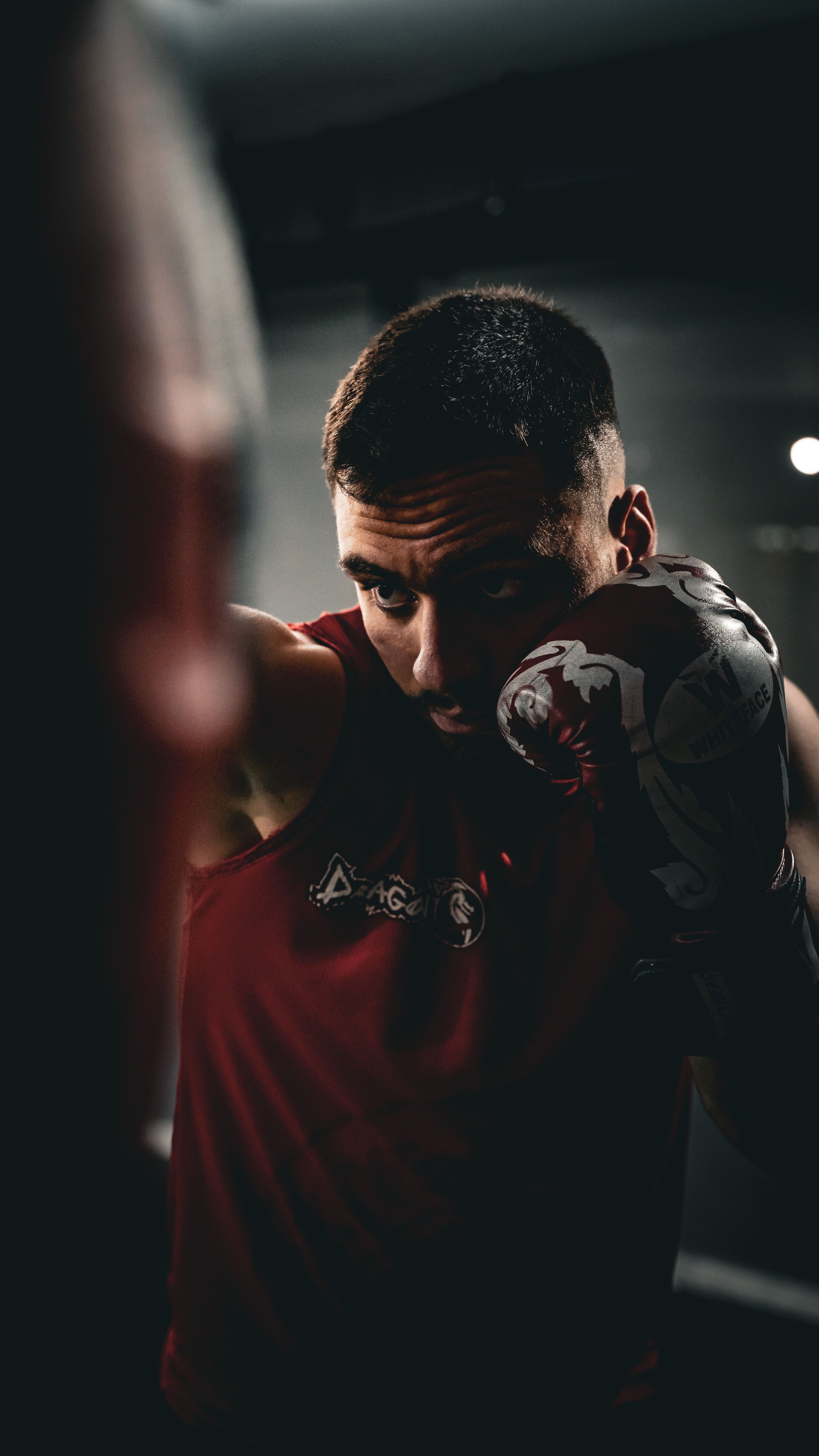 A man in a boxing ring training