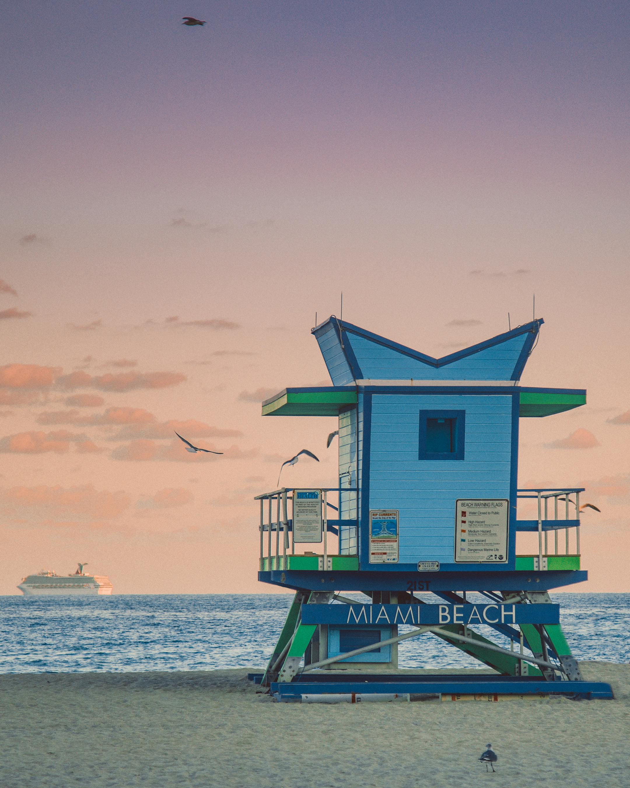 Vibrant Miami Beach lifeguard tower at sunset – surfboard rental in miami-beach