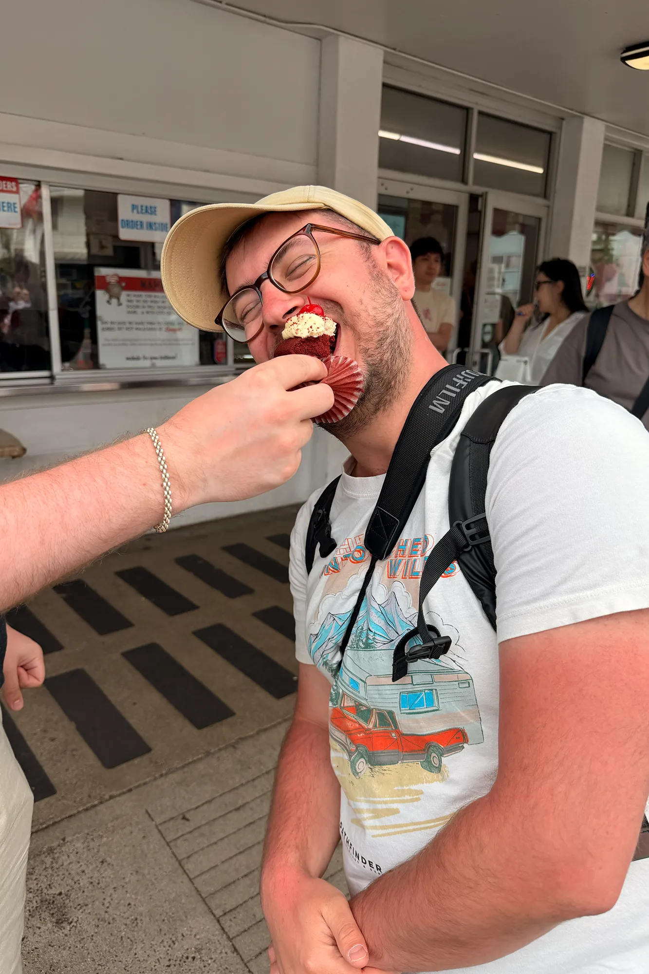 Martin Paseka eating a cupcake