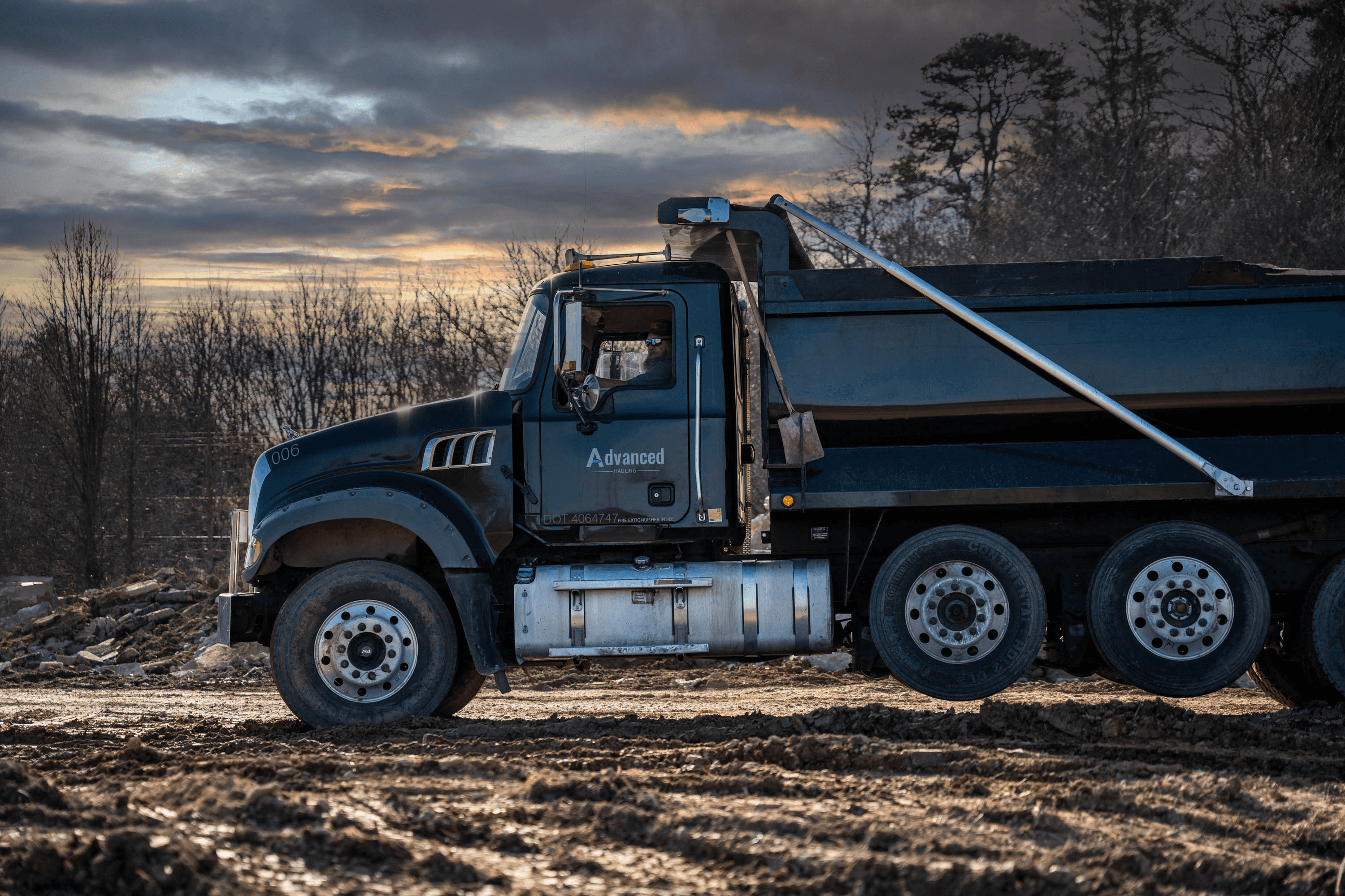 DUMP TRUCK IN THE DIRT